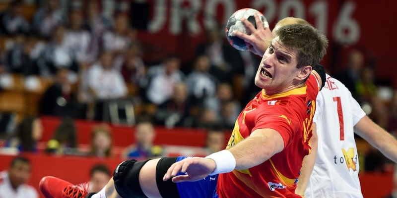 Julen Aguinagalde, of the Spanish handball team, jumps with the ball in his hand