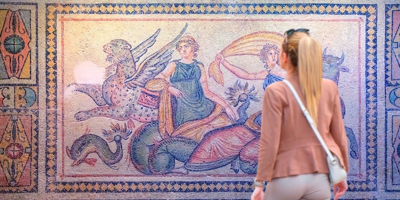 An ancient mosaic is displayed in a museum in Türkiye.