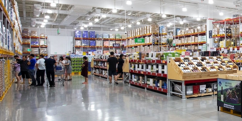 Customers look at products in a wholesale supermarket.