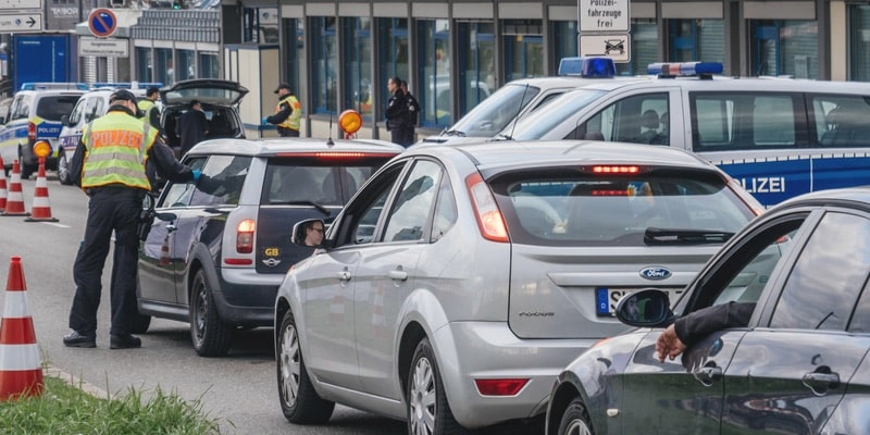 Police stop cars using legitimate coercion.