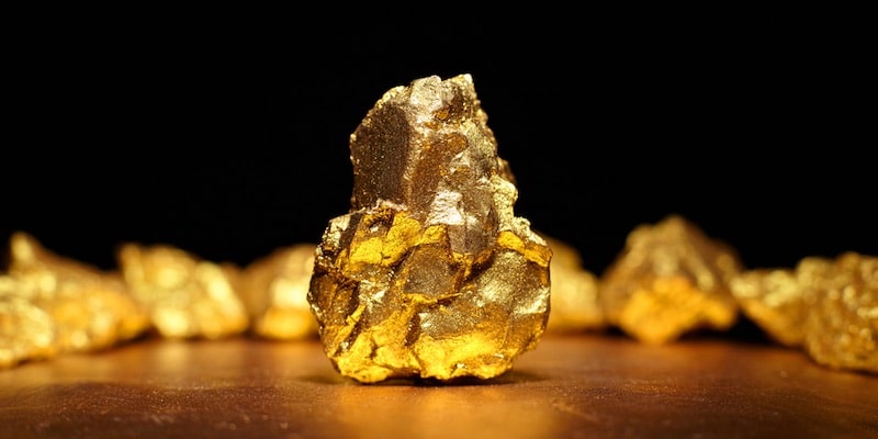 The gold nuggets are yellow and shiny.