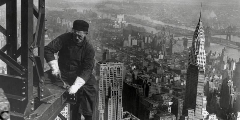 A worker works on the construction of the Empire State Building.