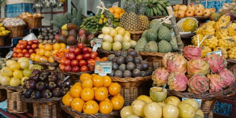 In a market there is an abundance of exotic fruits.